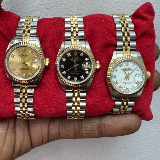 Women’s Rolex 26MM Datejust Two-Tone (Stainless Steel & 18K Yellow Gold) with a factory diamond hour-marker dial