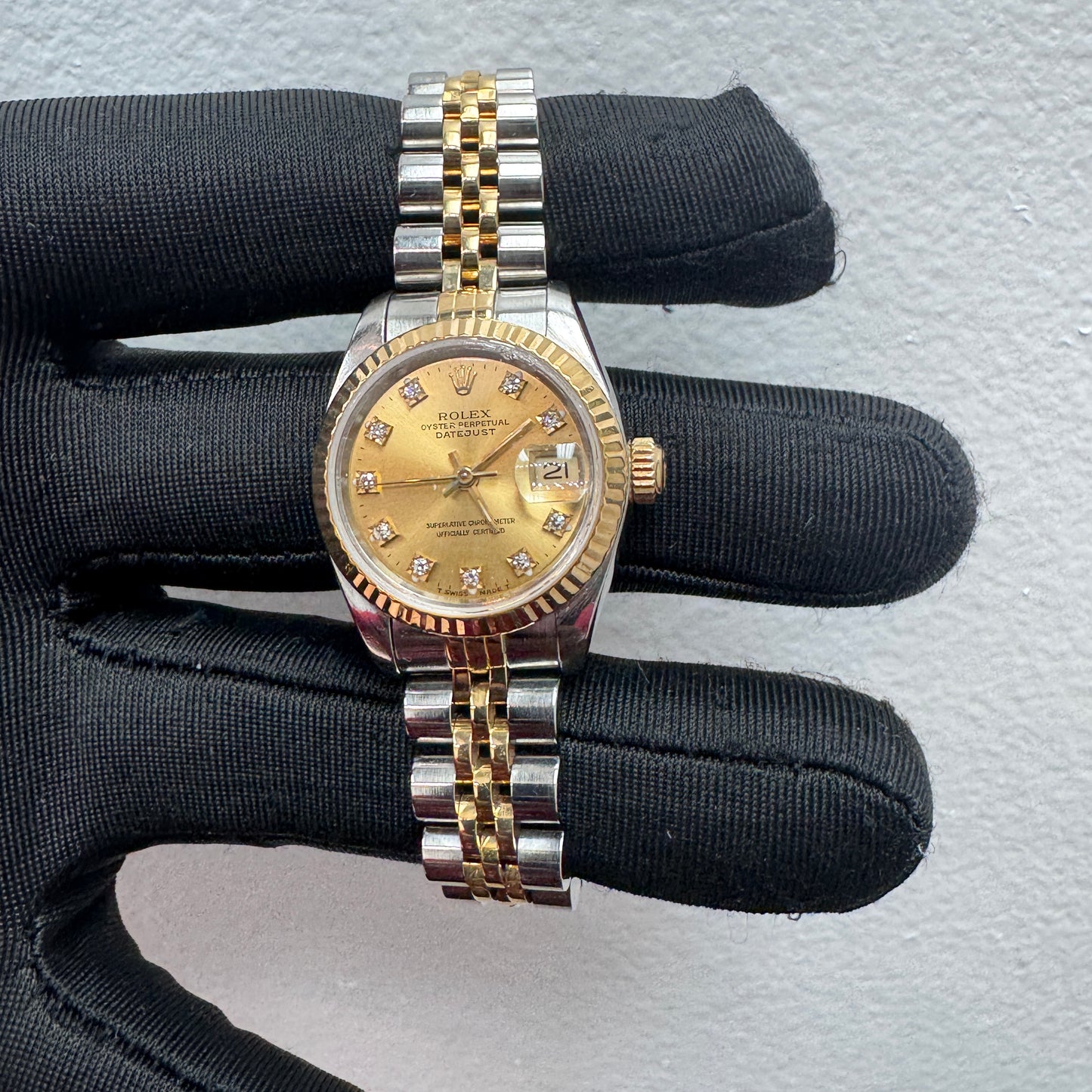 Women’s Rolex 26MM Datejust Two-Tone (Stainless Steel & 18K Yellow Gold) with a factory diamond hour-marker dial