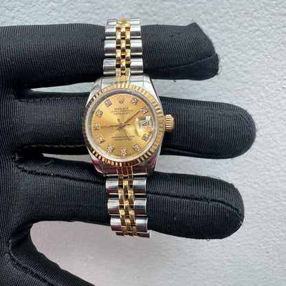 Women’s Rolex 26MM Datejust Two-Tone (Stainless Steel & 18K Yellow Gold) with a factory diamond hour-marker dial