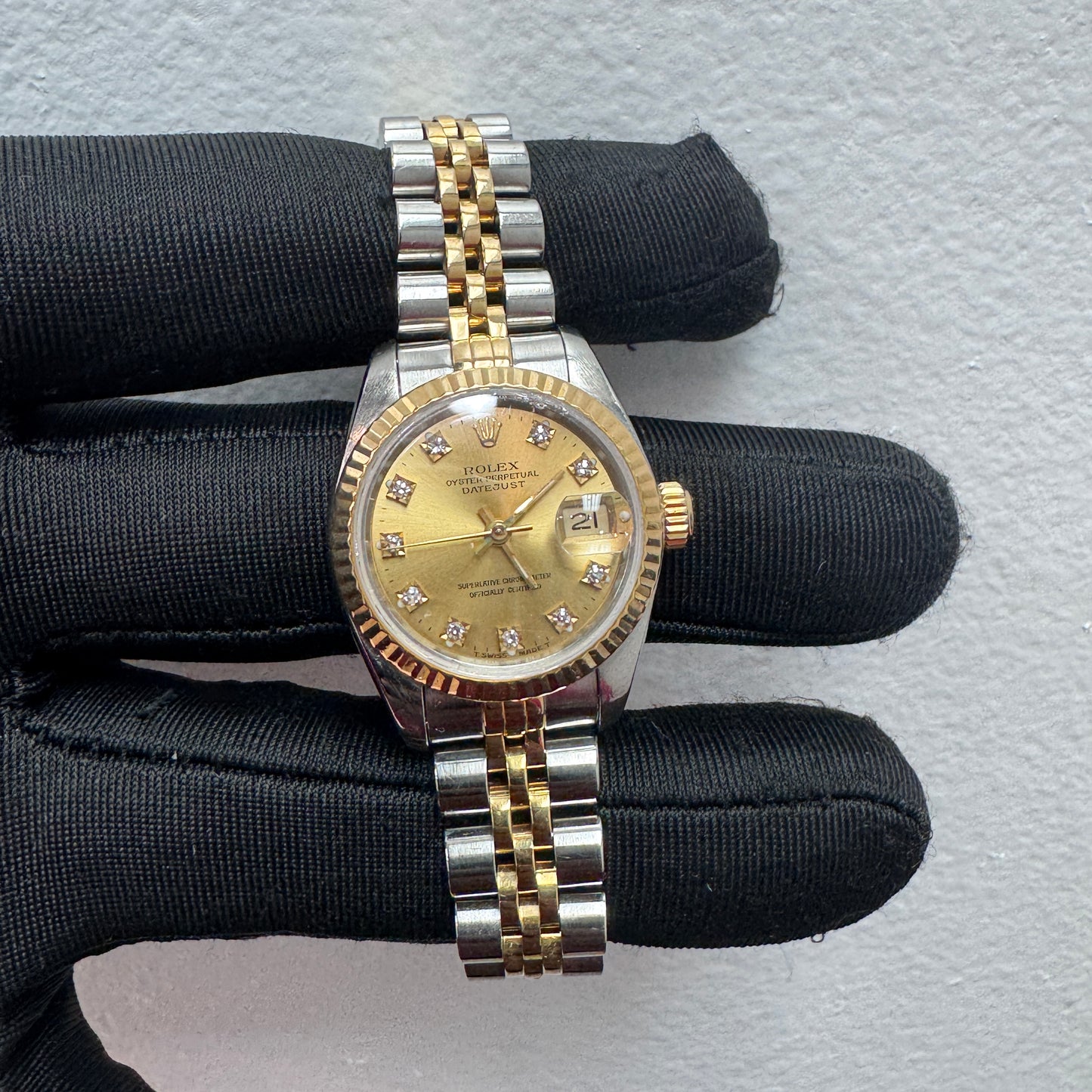 Women’s Rolex 26MM Datejust Two-Tone (Stainless Steel & 18K Yellow Gold) with a factory diamond hour-marker dial