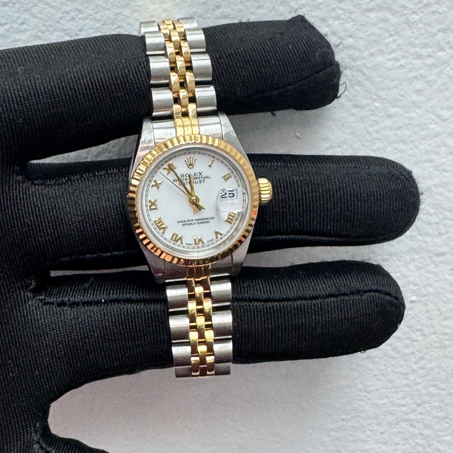 Women’s Rolex 26MM Datejust Two-Tone (Stainless Steel & 18K Yellow Gold) with a factory diamond hour-marker dial
