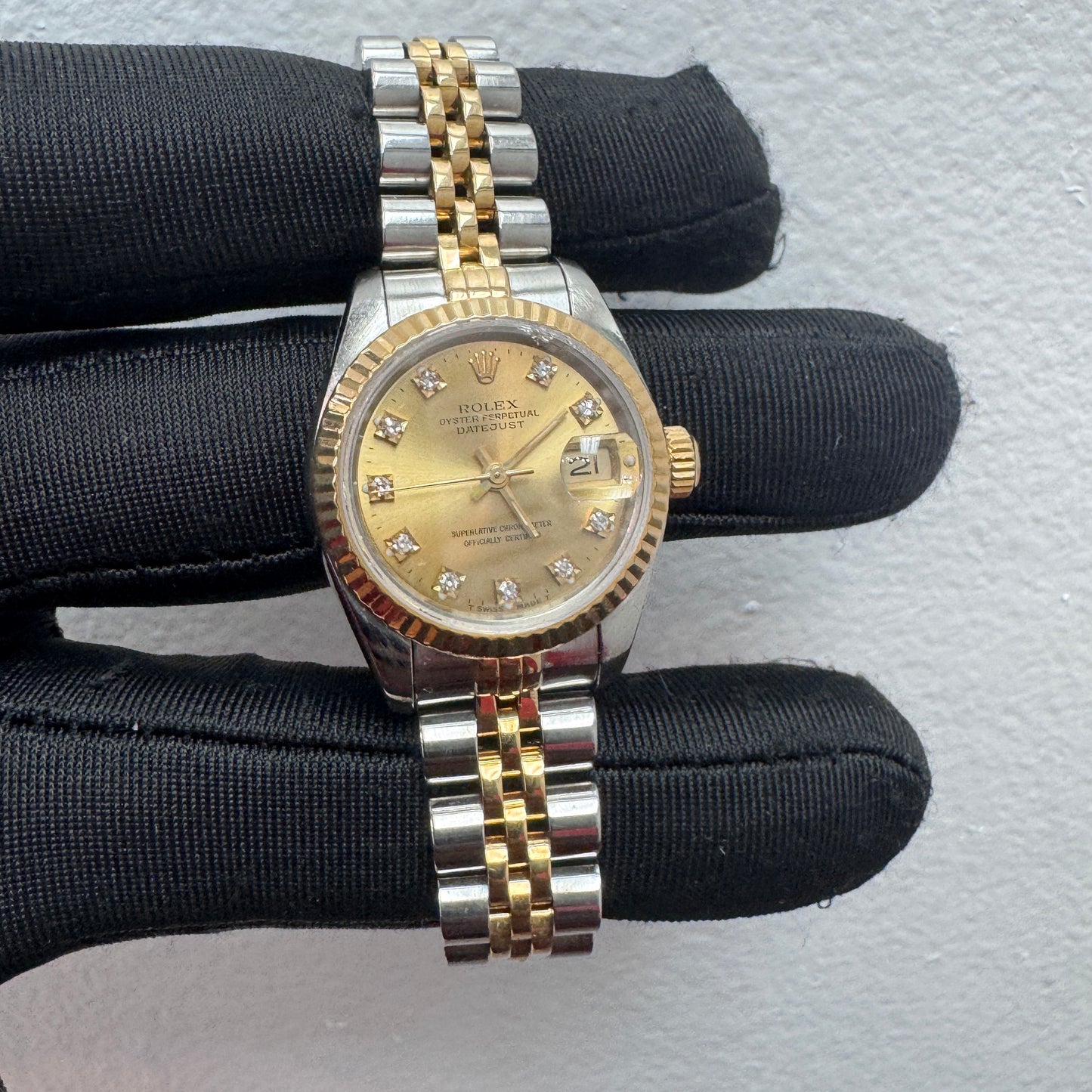 Women’s Rolex 26MM Datejust Two-Tone (Stainless Steel & 18K Yellow Gold) with a factory diamond hour-marker dial