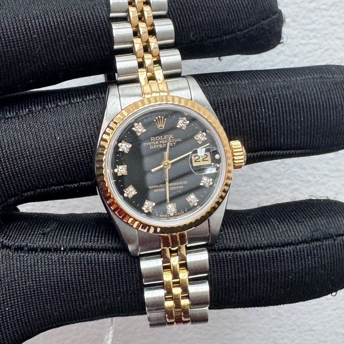 Women’s Rolex 26MM Datejust Two-Tone (Stainless Steel & 18K Yellow Gold) with a factory diamond hour-marker dial