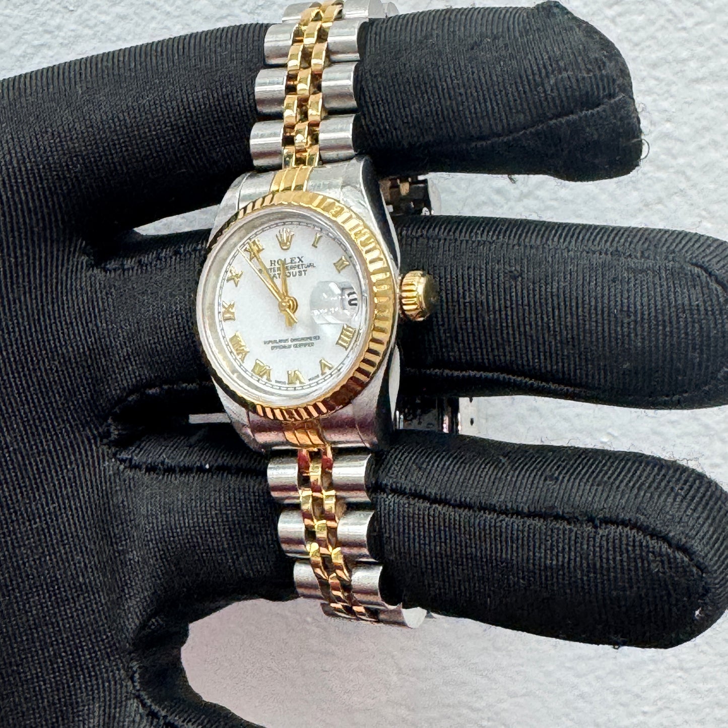 Women’s Rolex 26MM Datejust Two-Tone (Stainless Steel & 18K Yellow Gold) with a factory diamond hour-marker dial