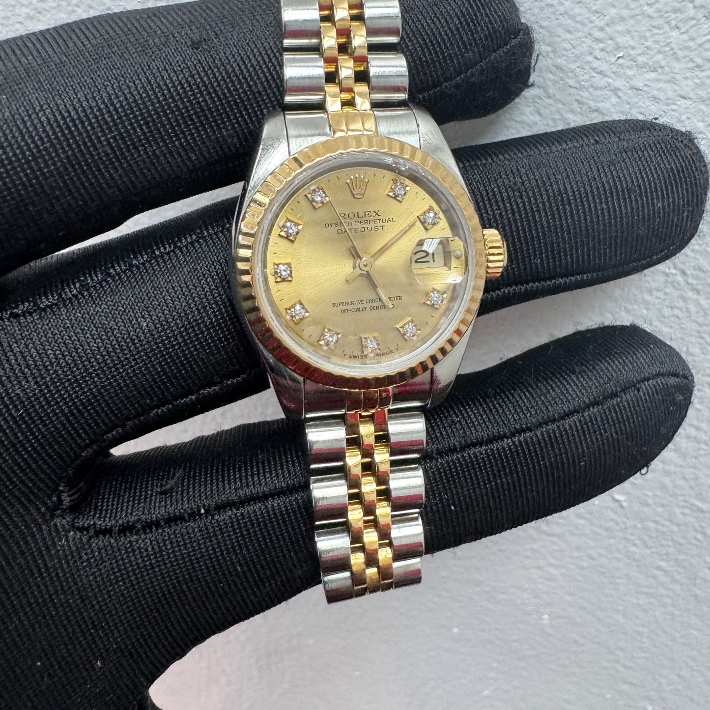Women’s Rolex 26MM Datejust Two-Tone (Stainless Steel & 18K Yellow Gold) with a factory diamond hour-marker dial